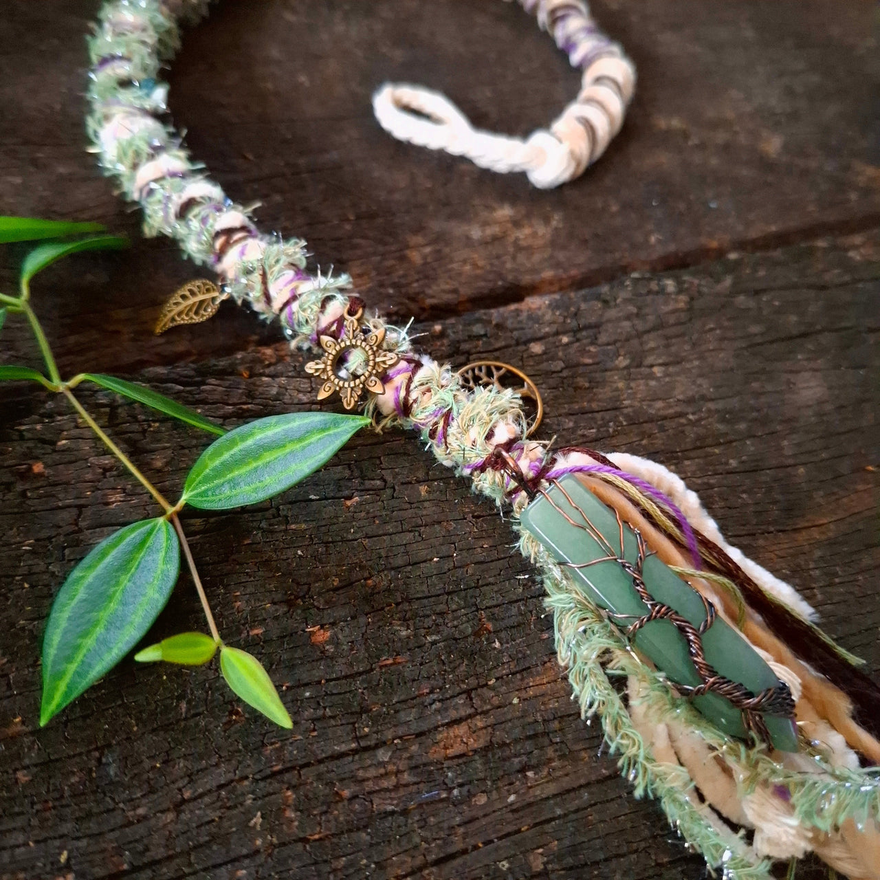 Cream dread wrap with brass charms