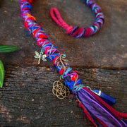 Dreadlock wrap with brass charms