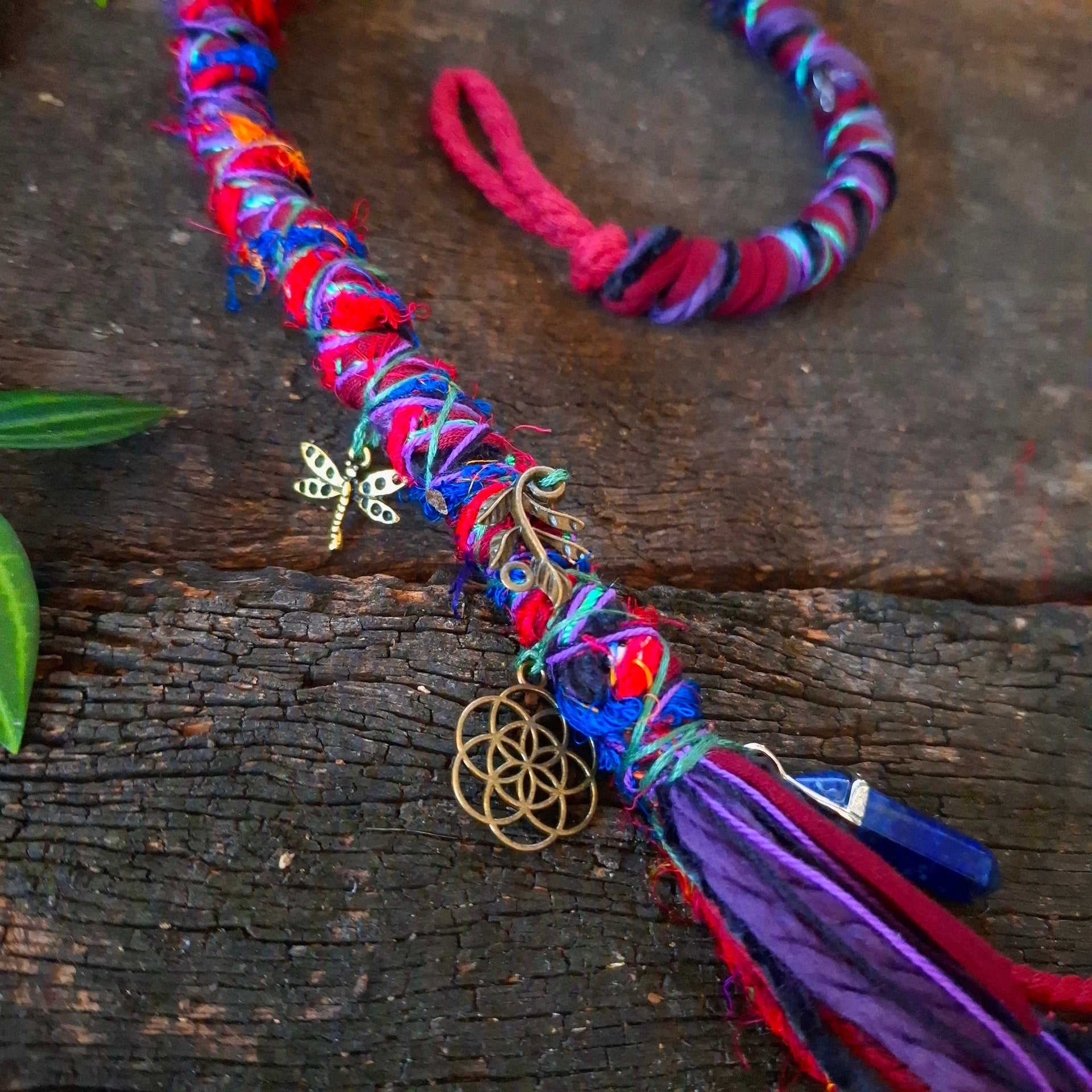 Dreadlock wrap with brass charms
