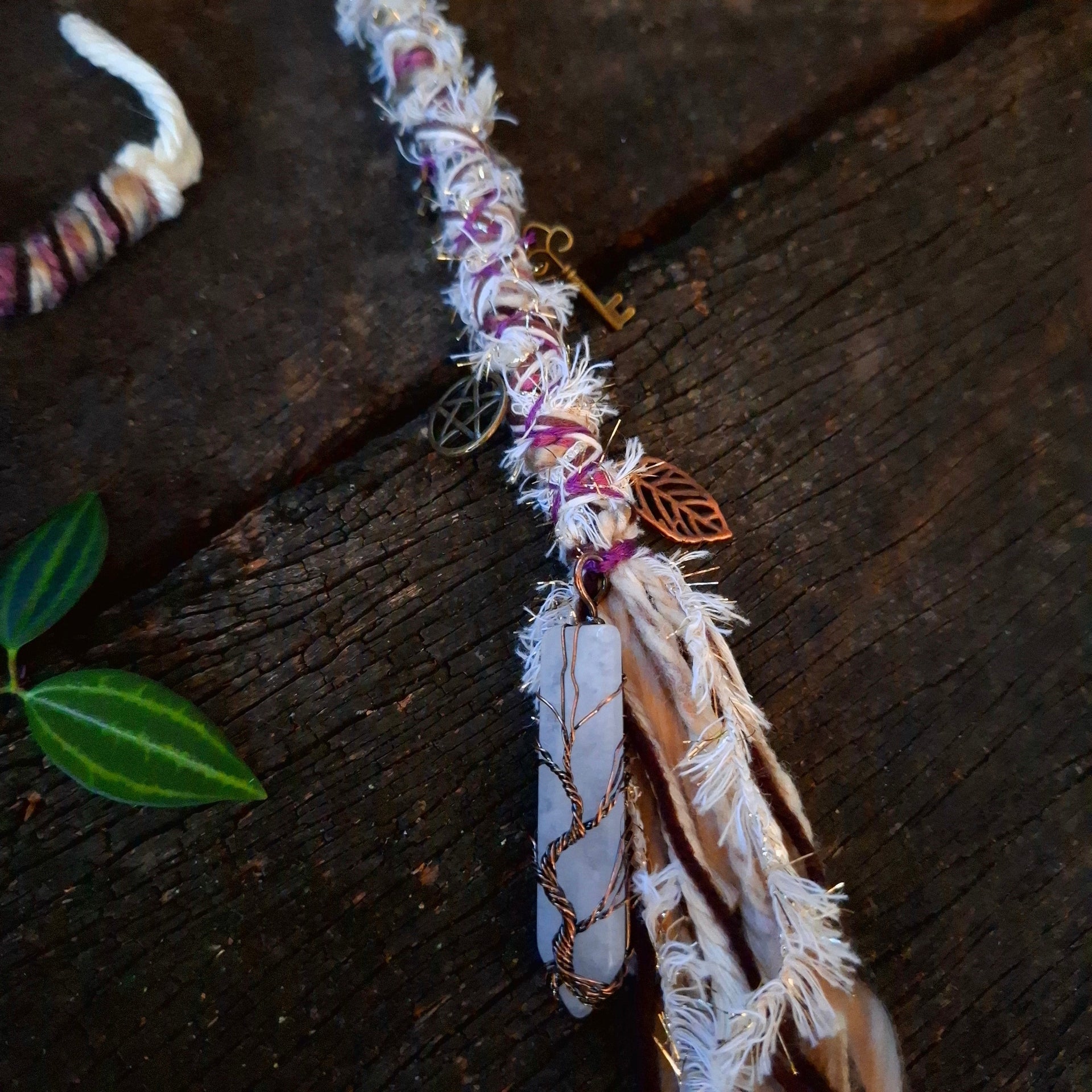 Dread wrap with brass charms