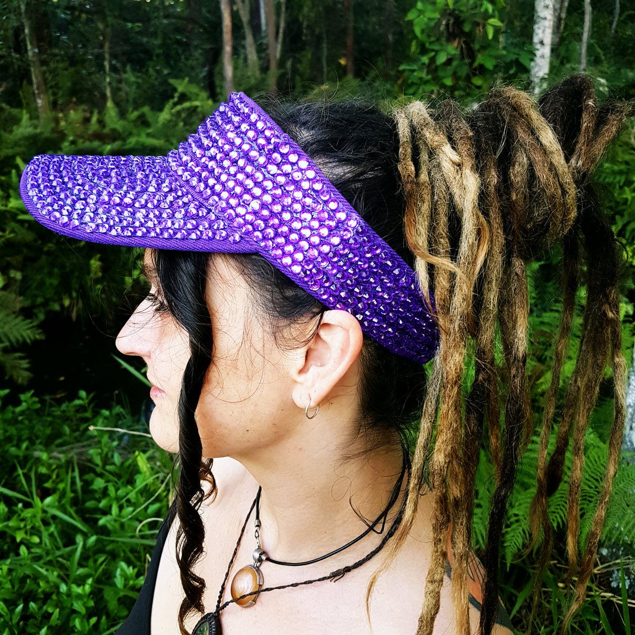 Purple sparkle visor hat side view