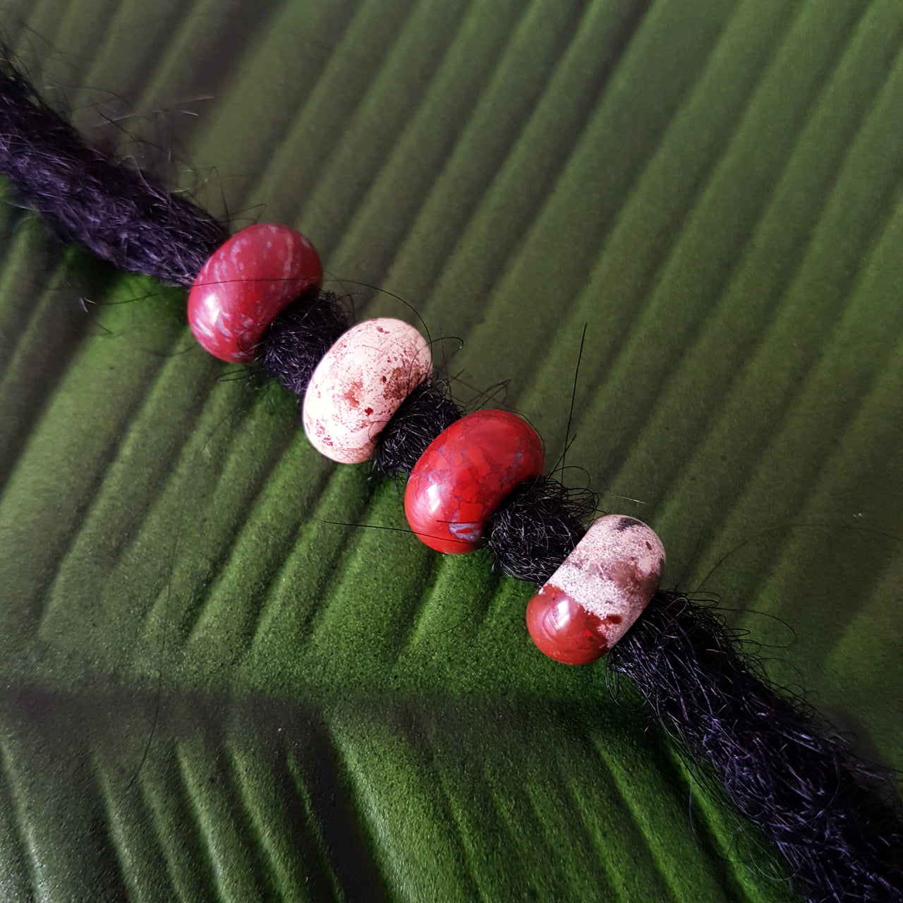 red brecciated jasper dreadlock beads