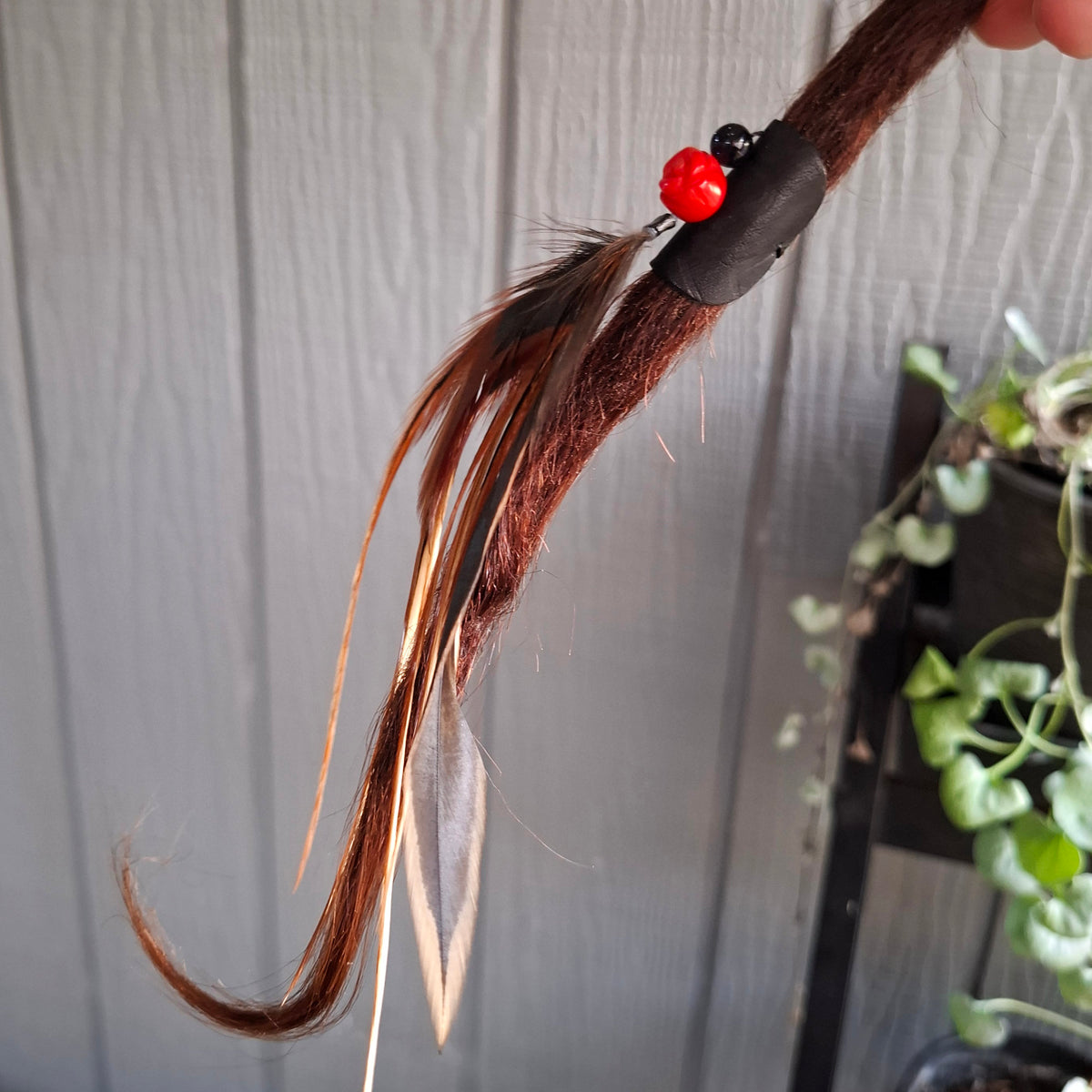 Rooster feather leather dreadlock cuff